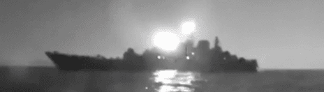 Naval vessel at night